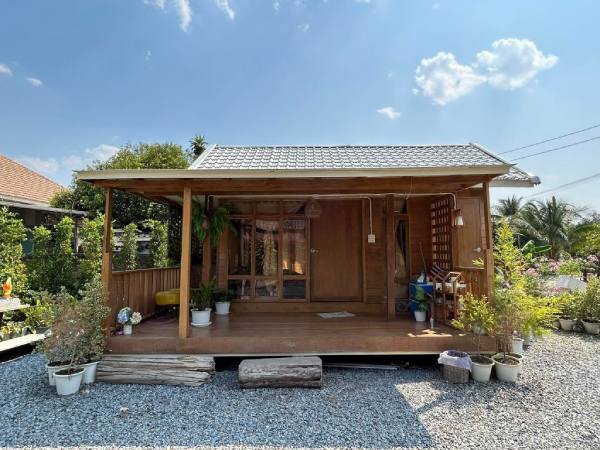 Chiêm bao bạn thân làm nhà gỗ